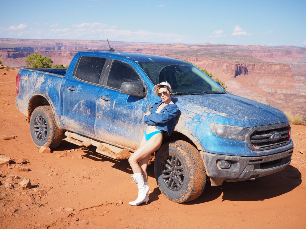 Kristy Jessica model in denim and her Muddy Truck
